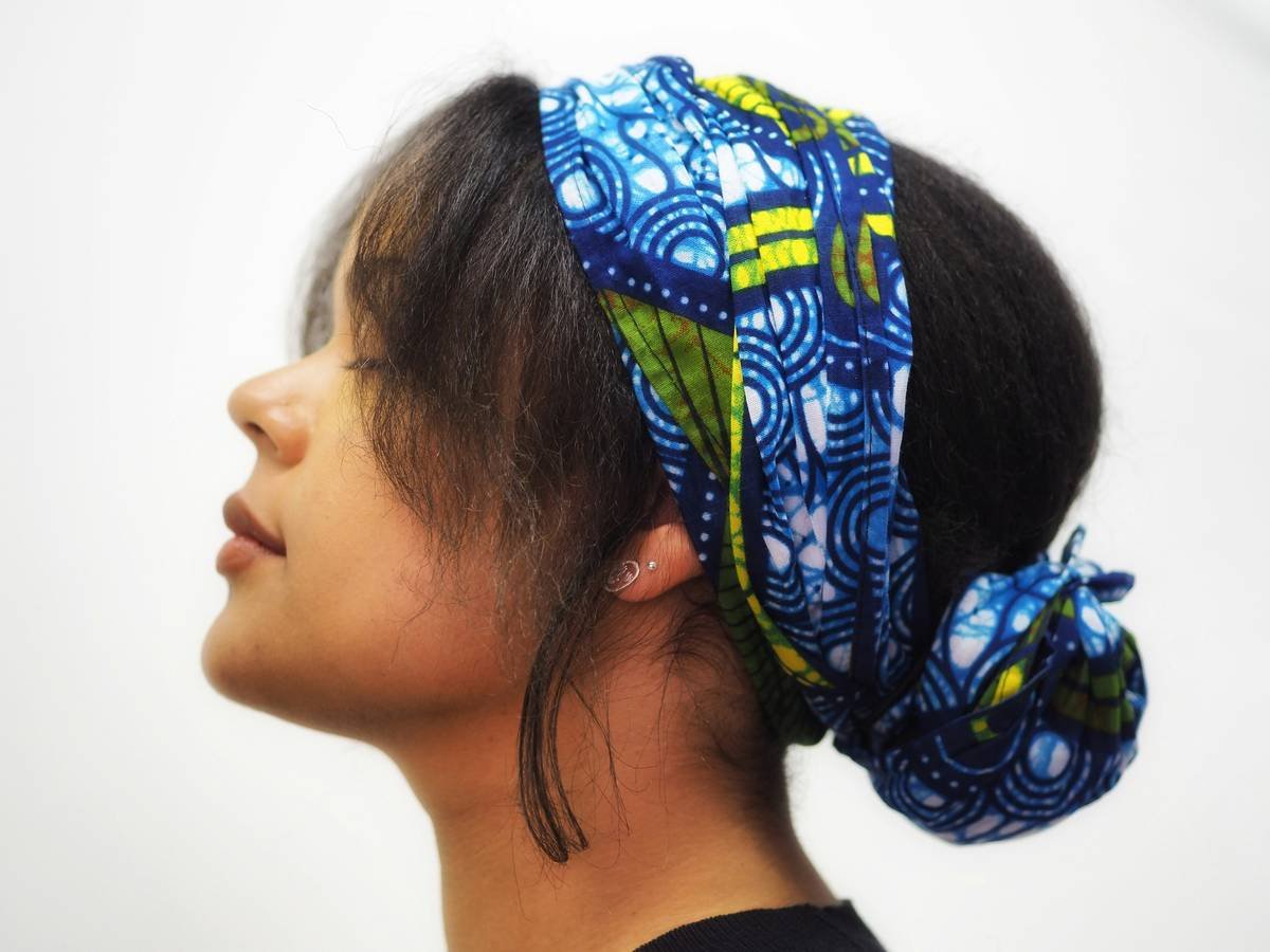 woman styling hair with minimalist hairbands for different hair types