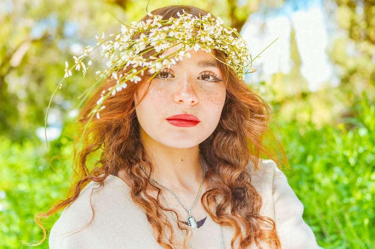 Close-up of different floral headbands showing material details and floral patterns