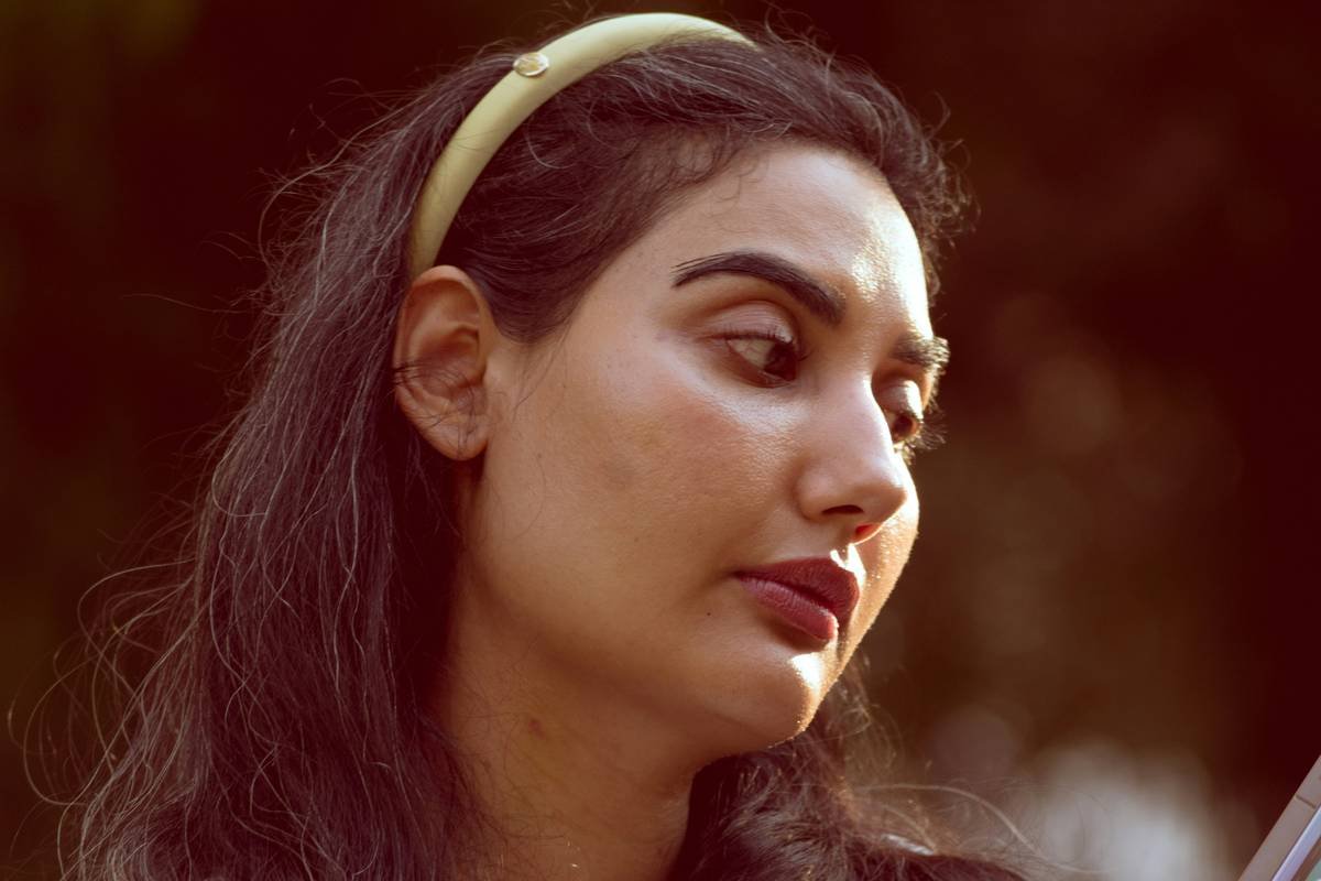 Woman wearing classic headbands in neutral tones for everyday wear